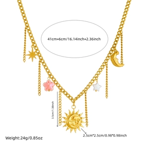 Gold celestial necklace with sun moon star and flower charms on white background