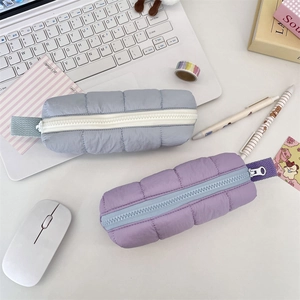 Quilted cloud texture pencil case set showing zipper details and side carrying straps