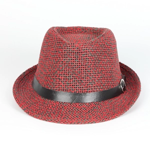 Detail of red and black woven Panama hat featuring a black leather band and silver buckle