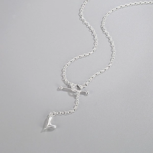 Minimalist S925 sterling silver necklace featuring a heart pendant and unique OT toggle clasp
