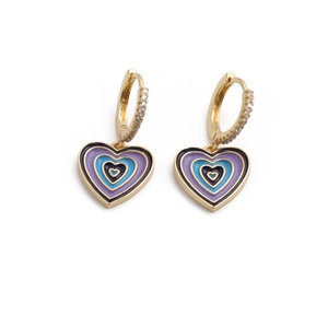 Detail of gold heart earrings with blue and purple enamel and zircon inlay