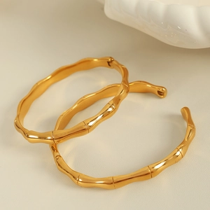 Polished gold bamboo joint bangles in minimalist vintage style for women