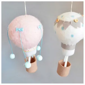 Handmade wool felt hot air balloon hanging ornaments in pink and white for room decor