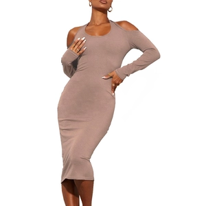 Detail of taupe midi knit dress featuring cold shoulder cutouts and ribbed fabric texture
