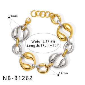 Close-up of chunky gold and silver mixed-metal bracelet showing specific weight and dimensions