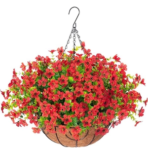 Close-up of artificial red violet flowers in a coconut palm liner hanging basket