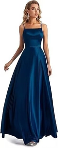 Detail shot of navy blue satin evening dress featuring sleek side slit and adjustable straps