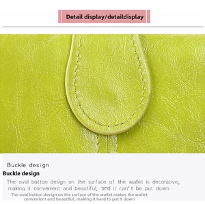 Close-up of lime green pebbled leather wallet with oval buckle and fine stitching detail