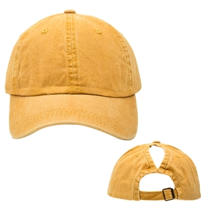 Detail of washed cotton ponytail baseball hat in ginger yellow with adjustable back opening