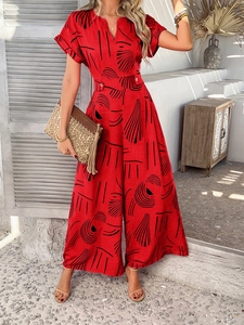 Fashionable red floral print short sleeve jumpsuit with V-neck and wide-leg design for vacation