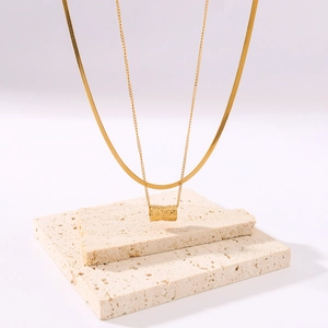 Double layered 18K gold plated snake chain necklace with textured cylinder pendant