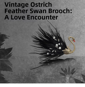 Detailed view of vintage swan brooch with black ostrich feathers, pearls and crystals