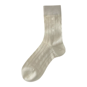 Minimalist cream cotton mid-tube socks featuring sweet jacquard bow patterns and ribbed cuffs