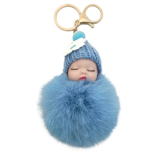 Cute sleeping doll plush keychain with light blue faux fur pompom and metal ring