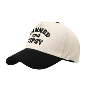 Two-tone baseball cap with TANNED and TIPSY embroidery in beige and black