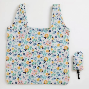 Foldable floral eco-friendly shopping bag with matching pouch and hook on white background