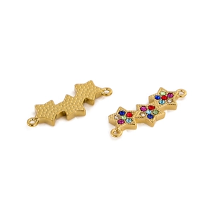 Detailed view of two gold-plated star charms with colorful rhinestones and double rings