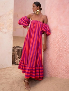 Detail of off-shoulder lantern sleeves and vertical stripes on a beach maxi dress