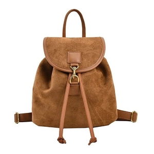Brown faux suede drawstring backpack for women with leather trim and gold hardware