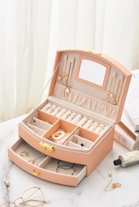 Pink faux leather jewelry box with mirror, necklace hooks, rings slots and drawer detail