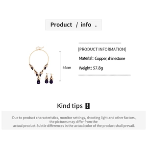 Detailed specs for vintage drop jewelry set featuring purple rhinestones and copper material
