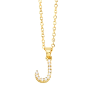 Detailed close-up of golden letter J necklace pendant with elegant faux pearl inlay