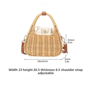 Detailed view of handmade straw woven bag with dimensions width 23cm height 20.5cm and depth 8.5cm