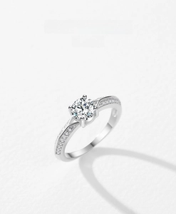 Macro view of a classic 4-prong S925 sterling silver ring with a round zircon stone
