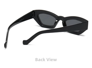 Rear view of vintage black cat-eye sunglasses featuring wide temples and metal hinges