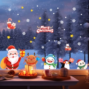 Close-up of Santa, reindeer and snowman static window clings for Christmas decor