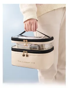 Double-layer travel toiletry bag in cream white PU and transparent PVC with handle