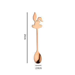 Detail view of rose gold bunny coffee spoon with 14cm length and 2.4cm width dimensions