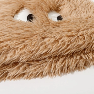 Cute brown plush bucket hat featuring large cartoon eyes and long faux fur texture