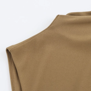 Detail of shoulder stitching and elastic ribbed knit fabric on brown sleeveless dress
