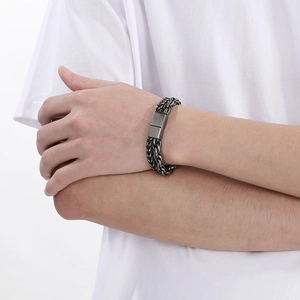 Detail of vintage silver double-layer chain bracelet with a heavy rectangular clasp