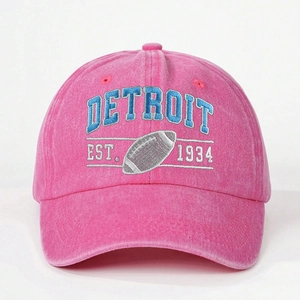 Pink washed cotton baseball cap with blue Detroit embroidery and retro sports style