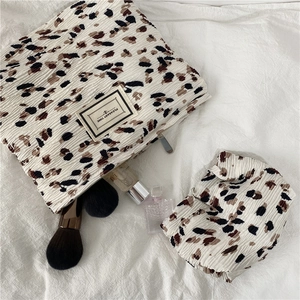 Chic leopard print pleated makeup bag set with Pleasant Time tag and gold zipper