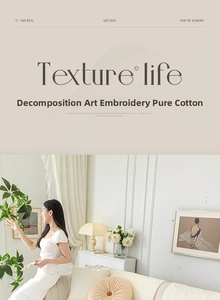 Detail of embroidered pure cotton sofa cover in cream beige for a minimalist home decor