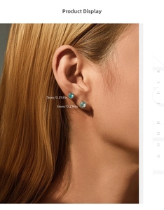 Detailed comparison of 5mm and 6mm light blue round cut silver stud earrings on ear