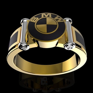 Macro shot of 3D-rendered gold-tone ring featuring a square face and prominent BMW logo detail