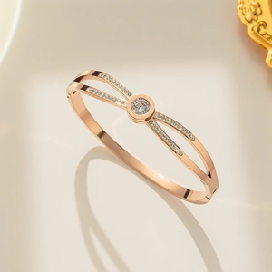 Rose gold Roman numeral bangle with hollow frame and brilliant zircon stones