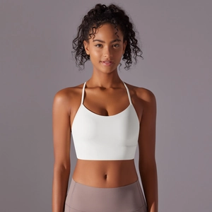 Detailed front view of a white racerback sports bra with soft brushed fabric for yoga