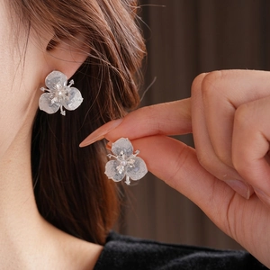 Silver flower stud earrings with zircon crystals and pearl center for women