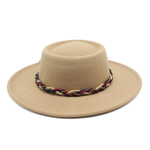 Detailed macro view of the khaki wool felt fedora with a colorful braided headband accent