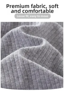 Close-up of grey ribbed knit fabric showing soft texture and high elasticity for baby clothes