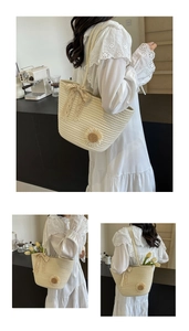 Detail of hand-woven tote bag featuring sunflower accent and lace ribbon bow