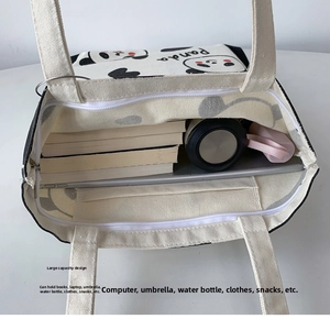 Geräumiger Innenraum der Panda Canvas Tragetasche mit Platz für Laptop und Zubehör