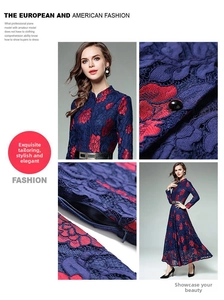 Detail of red and blue floral lace dress with stand collar and decorative black buttons