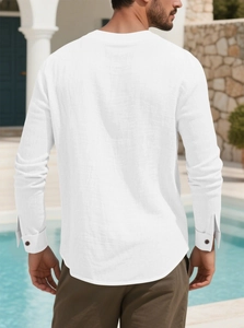 Rear view of white linen shirt showing breathable texture and tailored cut in sunlight