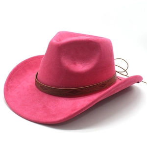 Close-up of rose red faux suede cowboy hat with embossed leather band and chin cord